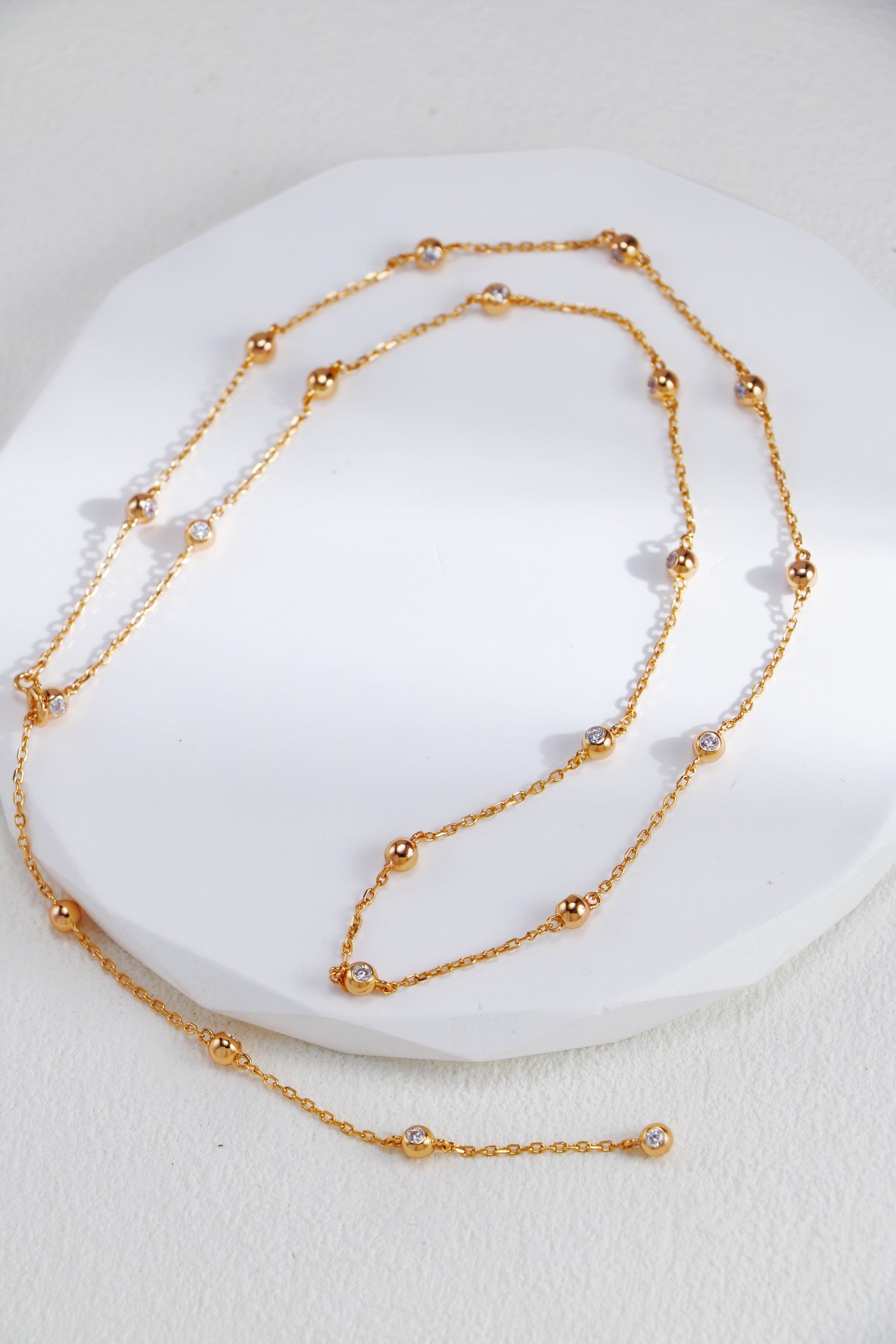 Silver Beaded Necklace, Earrings, and Bracelet with Zircon Inlay/ قلادة وأقراط وسوار من خرزٍ فضيّ مرصّعة بالزركون（GZD0432-GZSL0081）