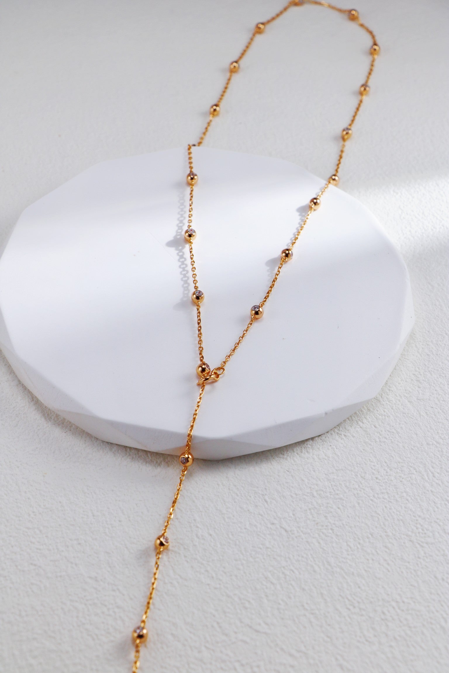 Silver Beaded Necklace, Earrings, and Bracelet with Zircon Inlay/ قلادة وأقراط وسوار من خرزٍ فضيّ مرصّعة بالزركون（GZD0432-GZSL0081）