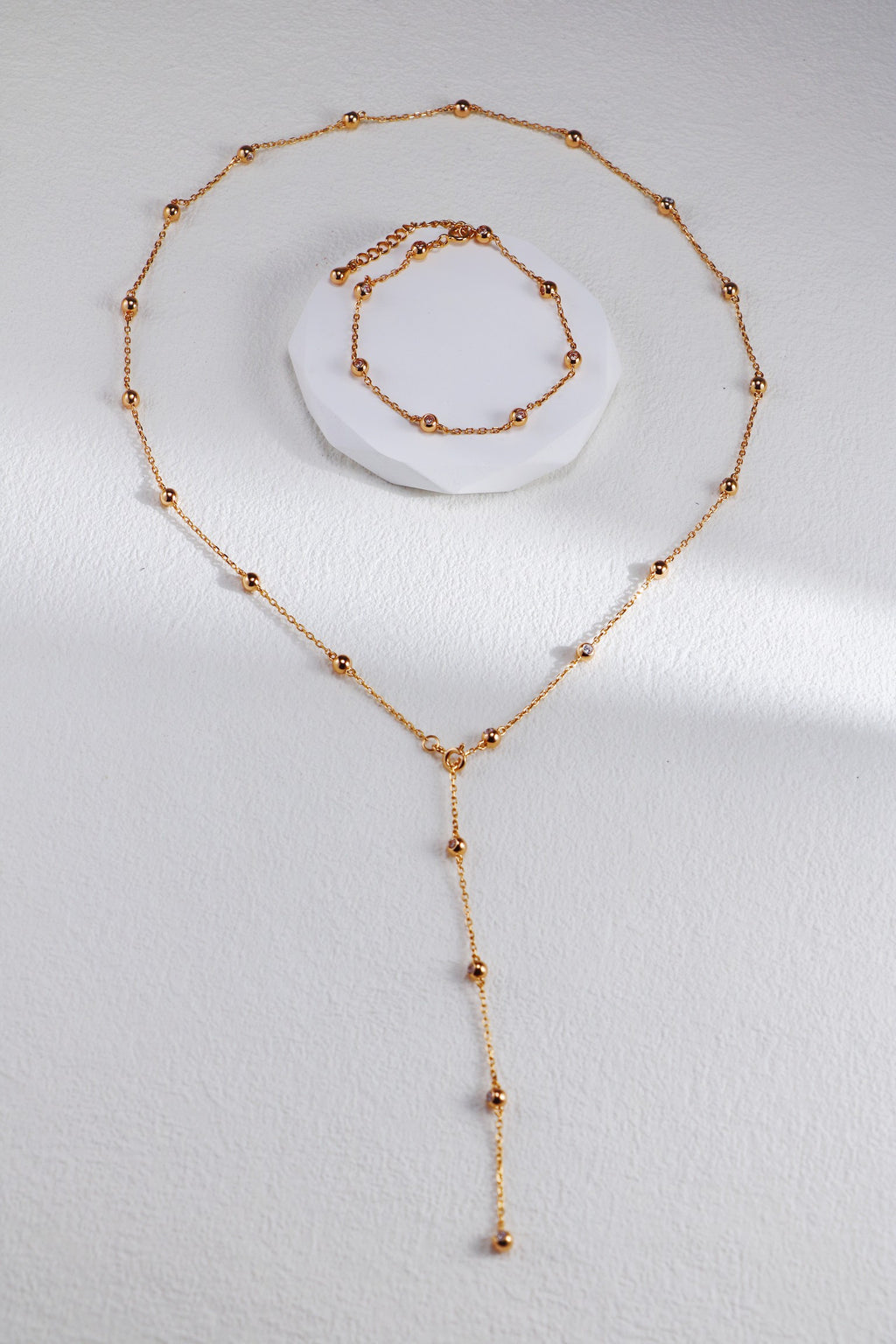 Silver Beaded Necklace, Earrings, and Bracelet with Zircon Inlay/ قلادة وأقراط وسوار من خرزٍ فضيّ مرصّعة بالزركون（GZD0432-GZSL0081）